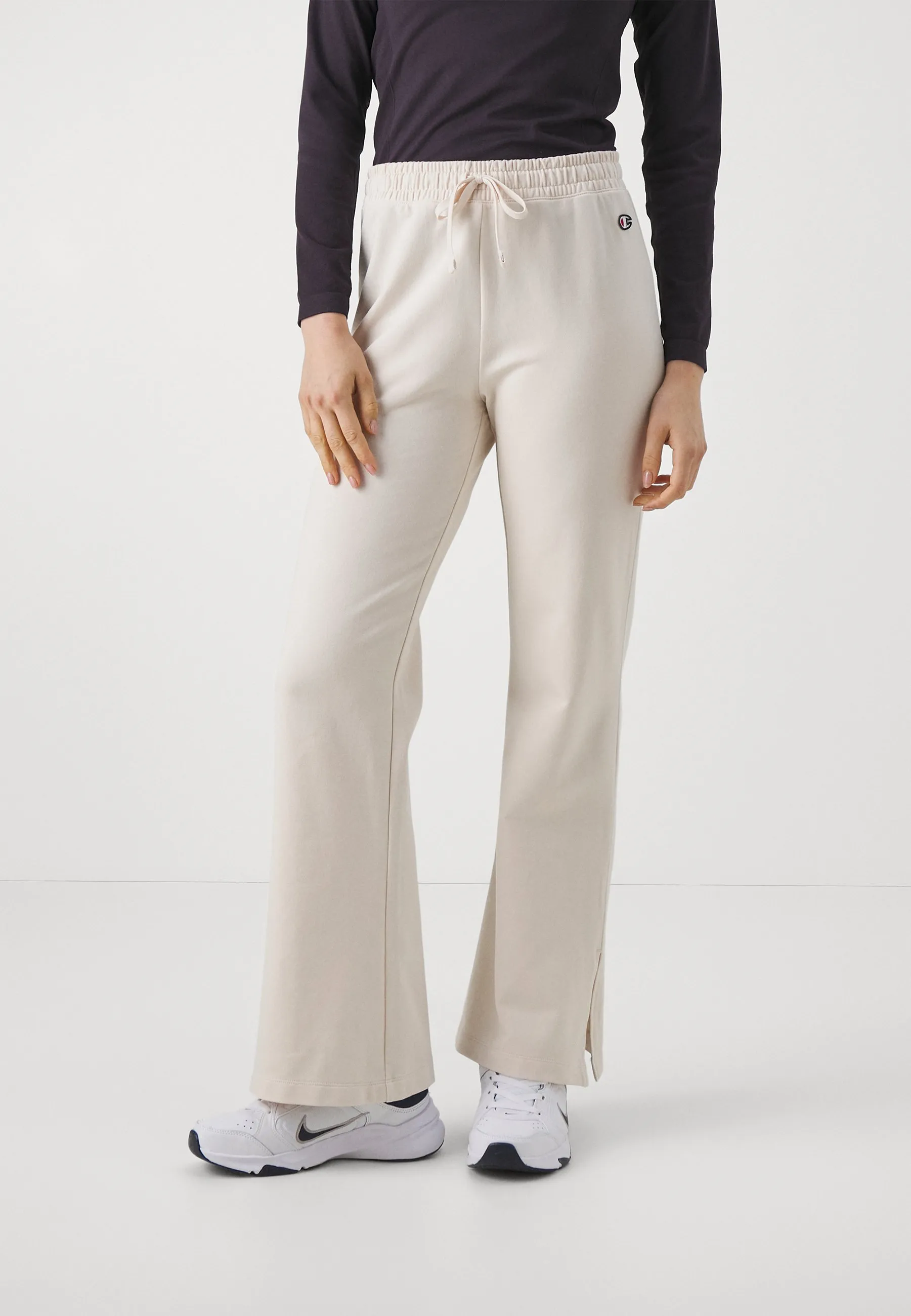 ICONS FLARE PANTS - Pantaloni sportivi