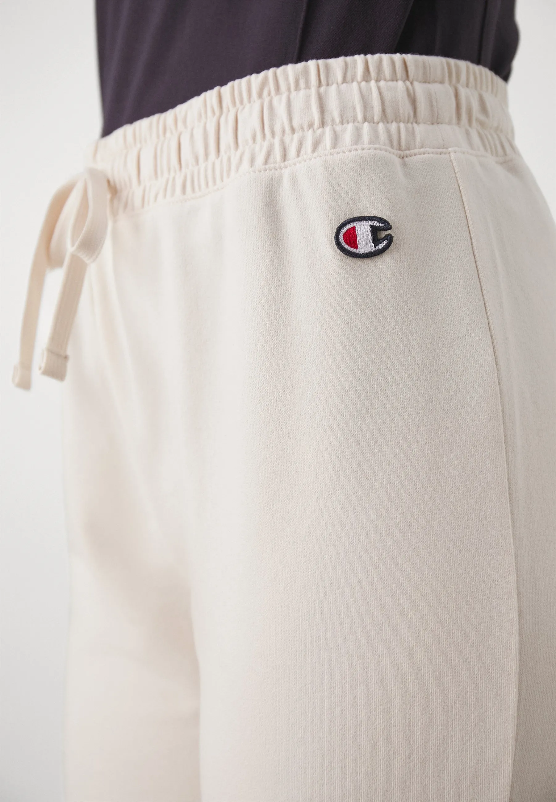 ICONS FLARE PANTS - Pantaloni sportivi
